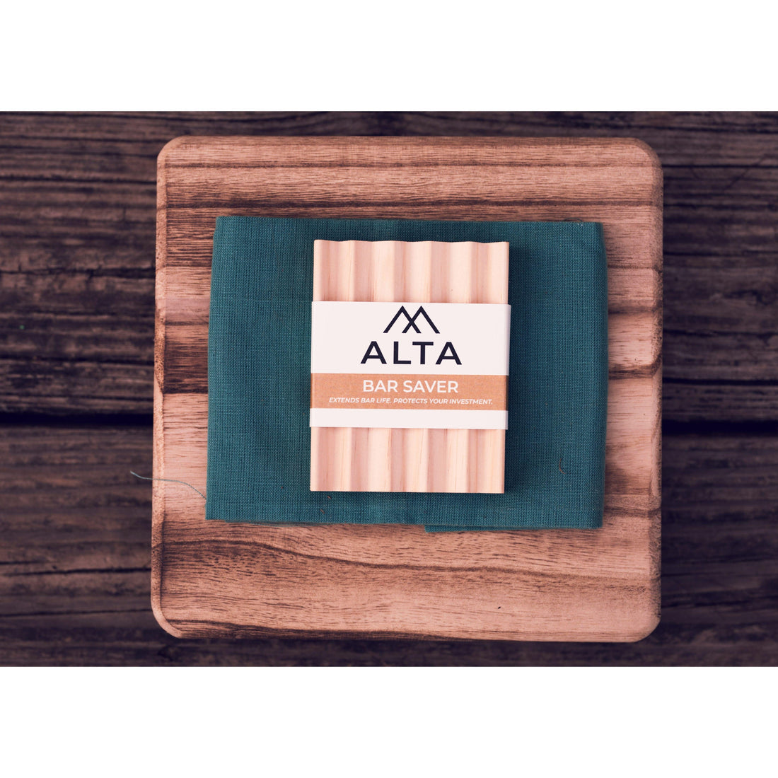 Handmade ALTA Bar Saver, a ventilated wooden soap dish crafted from sustainable USA timber to prevent soap from melting.