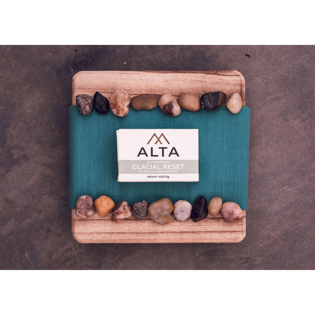 Glacial Reset natural bar soap by Alta Body. A refreshing tea tree and peppermint cold-process soap bar featuring real peppermint leaves.