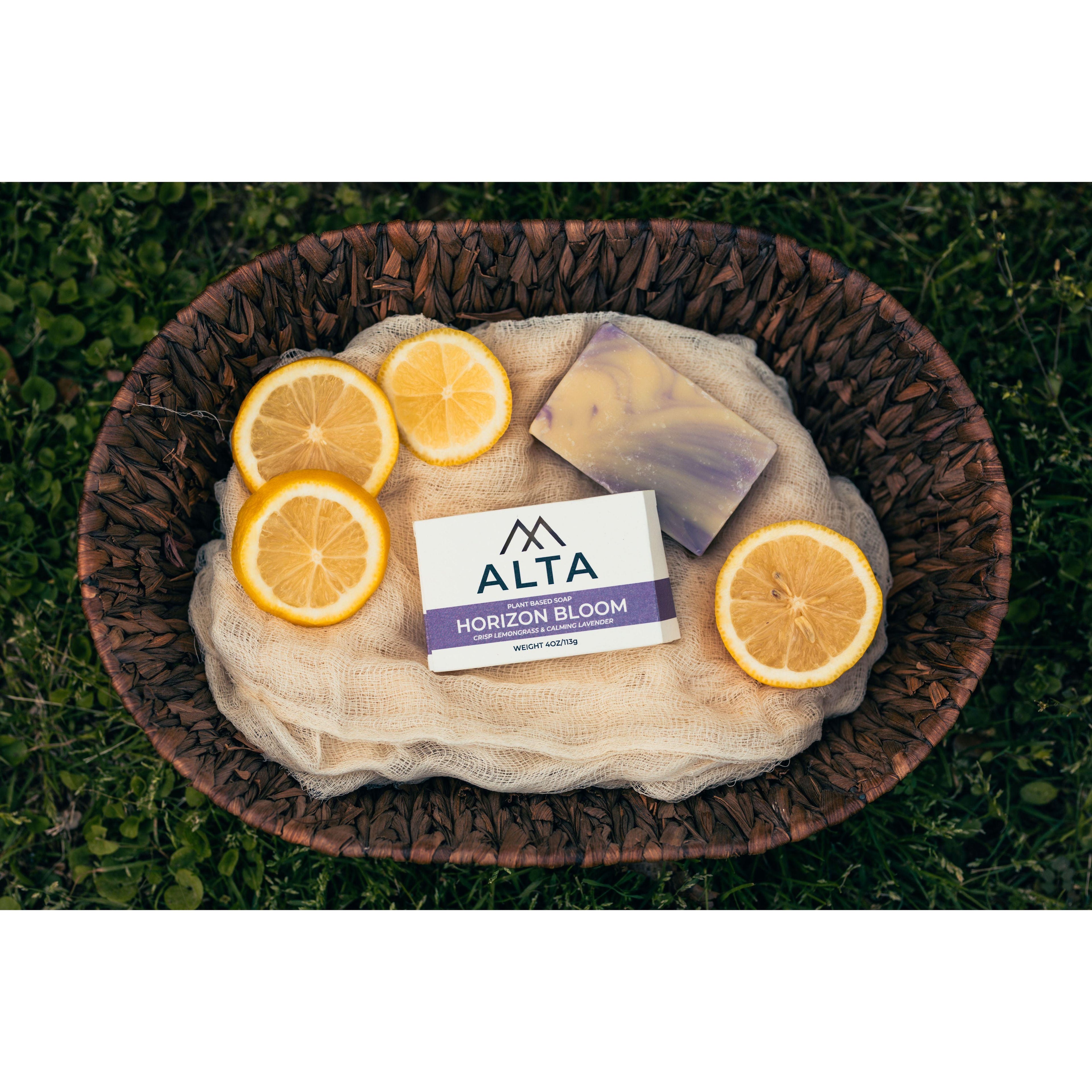 Horizon Bloom natural bar soap by Alta Body. A purple and yellow swirled cold-process soap bar featuring lavender and lemongrass.