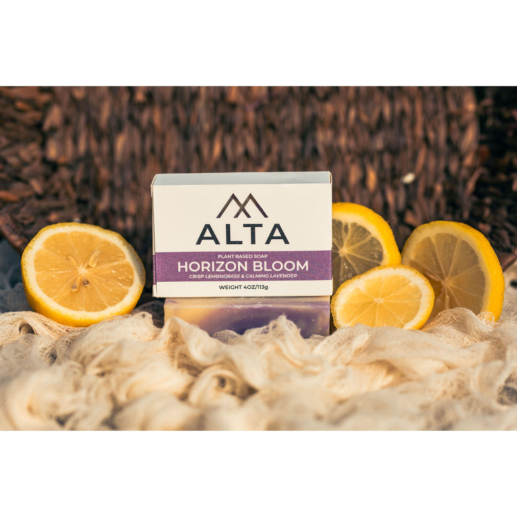 Horizon Bloom natural bar soap by Alta Body. A purple and yellow swirled cold-process soap bar featuring lavender and lemongrass.