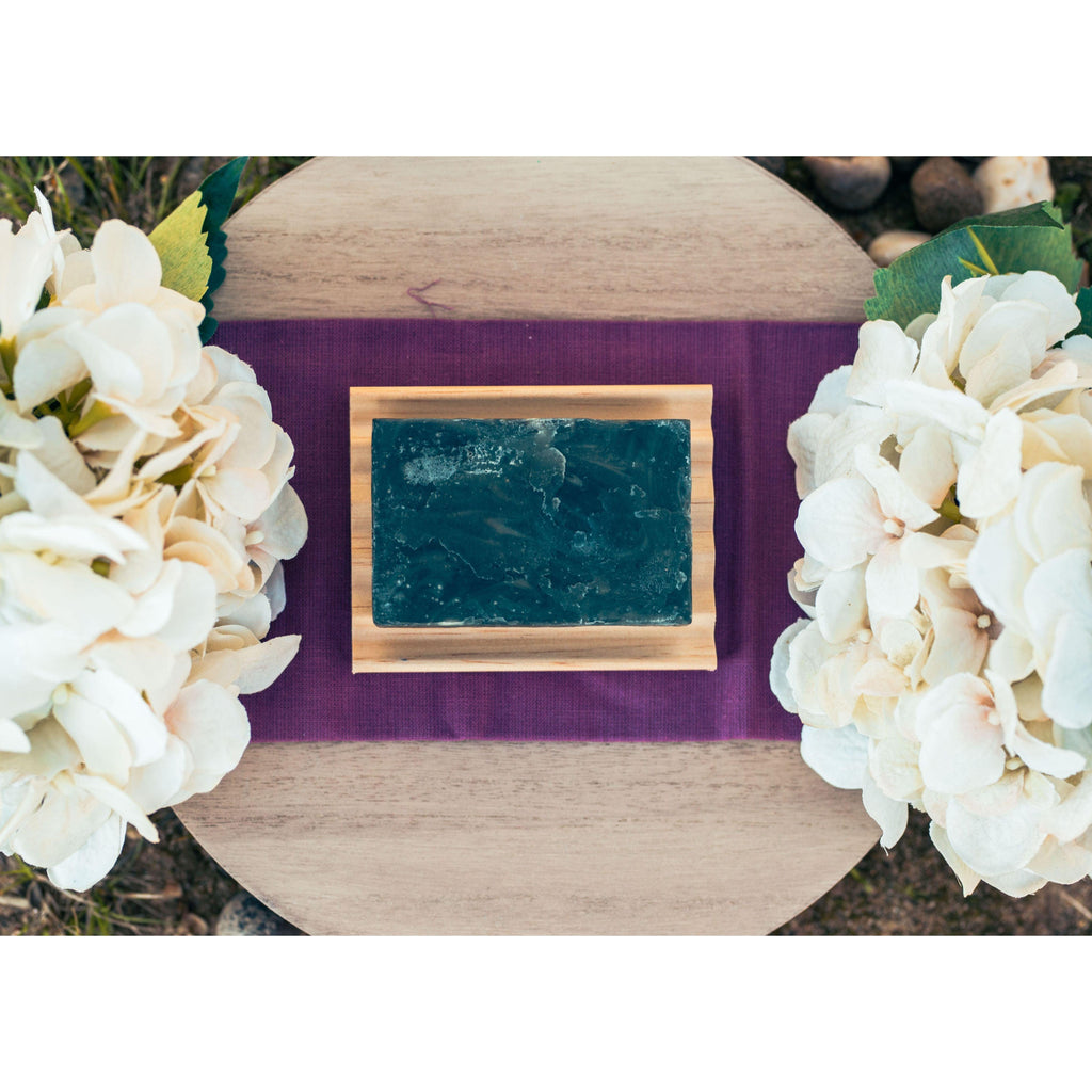 Midnight Forage natural bar soap by Alta Body. A dark, forest-inspired cold-process soap bar featuring charcoal and a woodsy sandalwood scent.