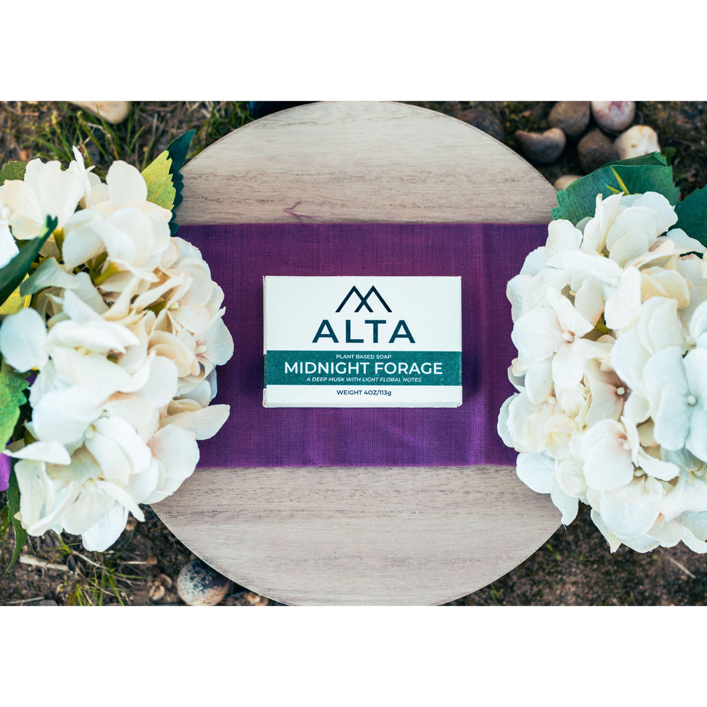 Midnight Forage natural bar soap by Alta Body. A dark, forest-inspired cold-process soap bar featuring charcoal and a woodsy sandalwood scent.