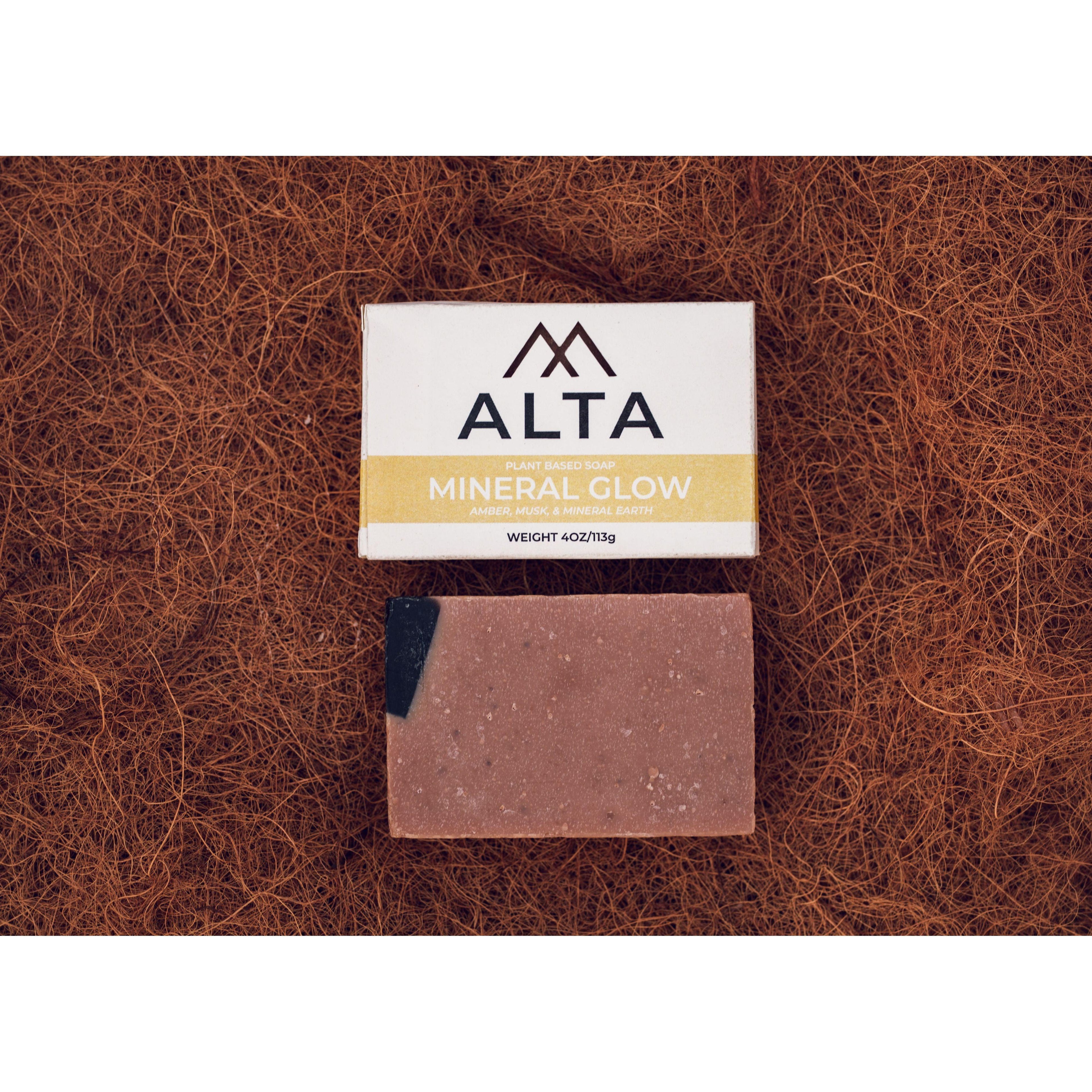 Alta Body Mineral Glow natural bar soap. A dark, textured Dead Sea mud and activated charcoal exfoliating cold-process soap bar.