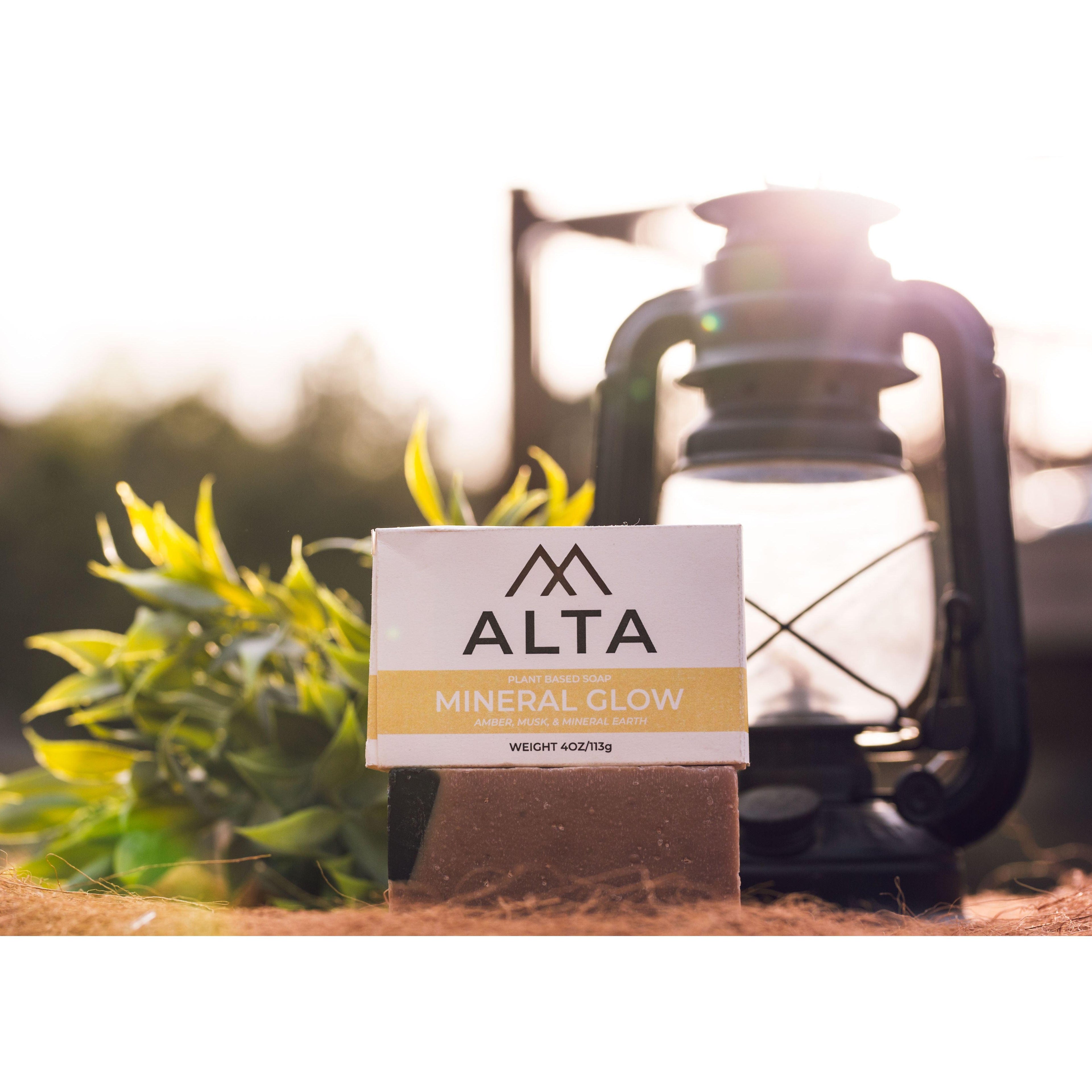 Alta Body Mineral Glow natural bar soap. A dark, textured Dead Sea mud and activated charcoal exfoliating cold-process soap bar.